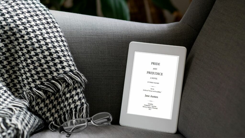 Best Kindle Settings to read at night: Kindle on a reading chair, black and white photo