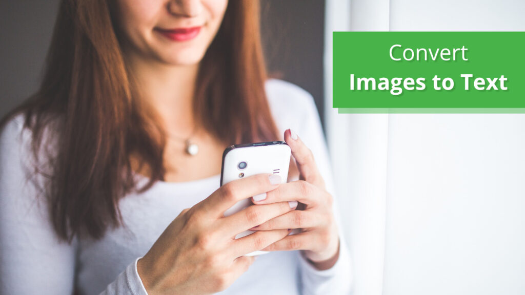 A woman is converting images to text on mobile device