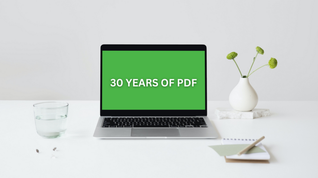 The laptop with a text saying: 30 Years Of PDF