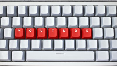 The red YouTube buttons shown on the keyboard.