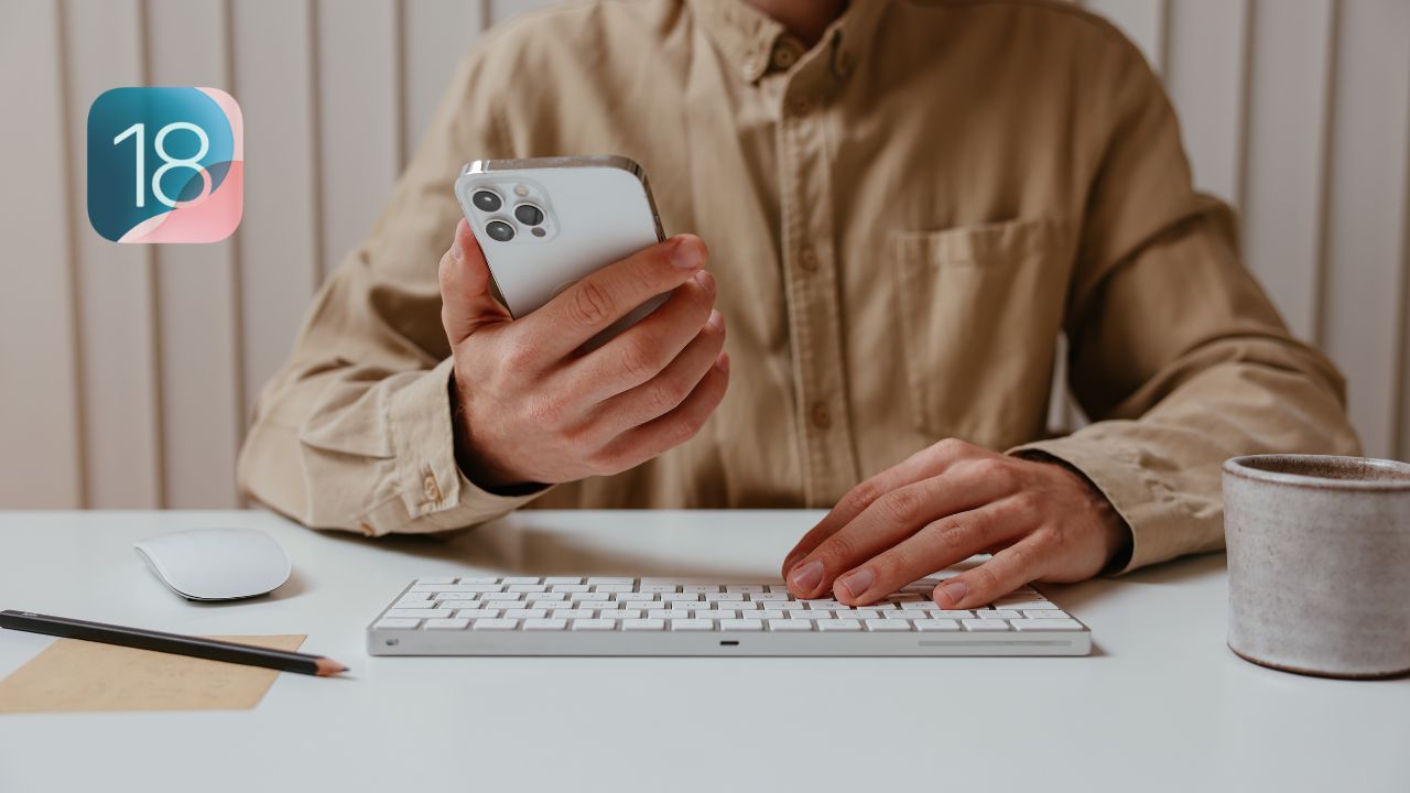 A man holding an iPhone and trying new iPhone tricks.